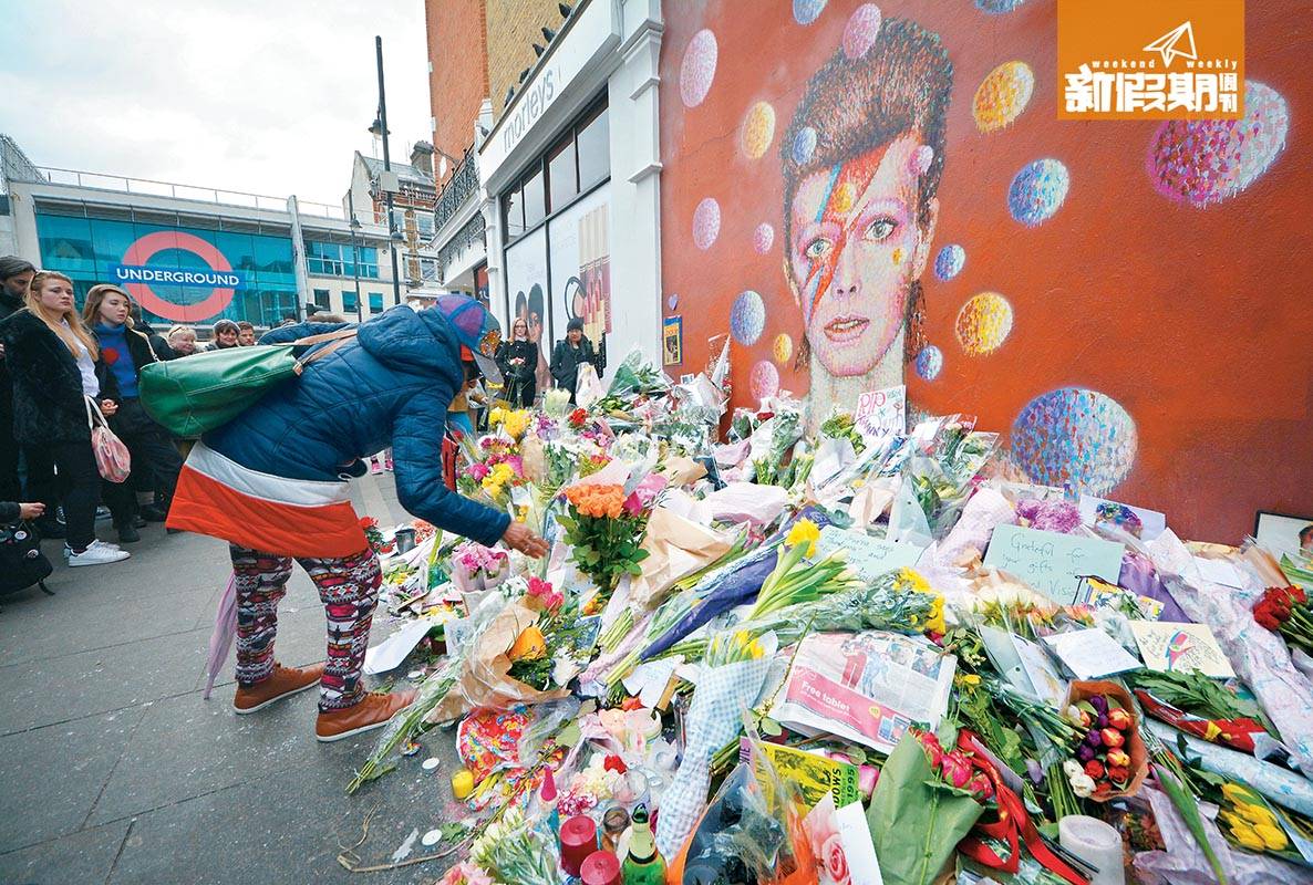 社區貨幣 只要一踏出Brixton地鐵站，就可以看見David Bowie的畫像及歌迷對他的思念。