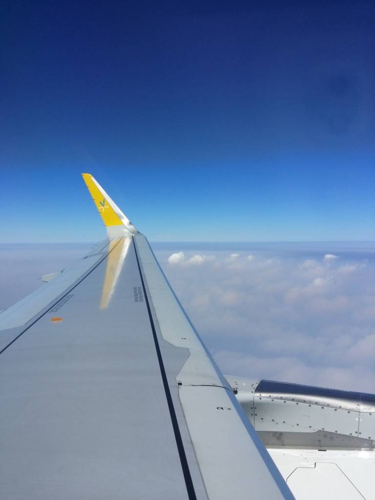 sharp yellow logo is especially eye catching in the sky