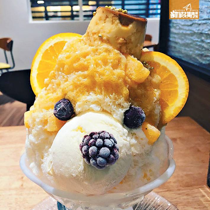 九州 白熊冰忠於最初設計，只用提子乾及櫻桃做「熊樣」，季節限定之柑橘黃熊冰可愛得多啦！