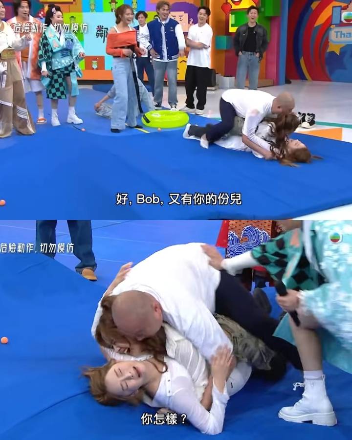 女神配對計劃 玩「障礙賽」環節時,Bob突然撲到Yuki身上,攬住佢同Sophie一齊轆,變成「人肉三文治」。(圖片來源:TVB)