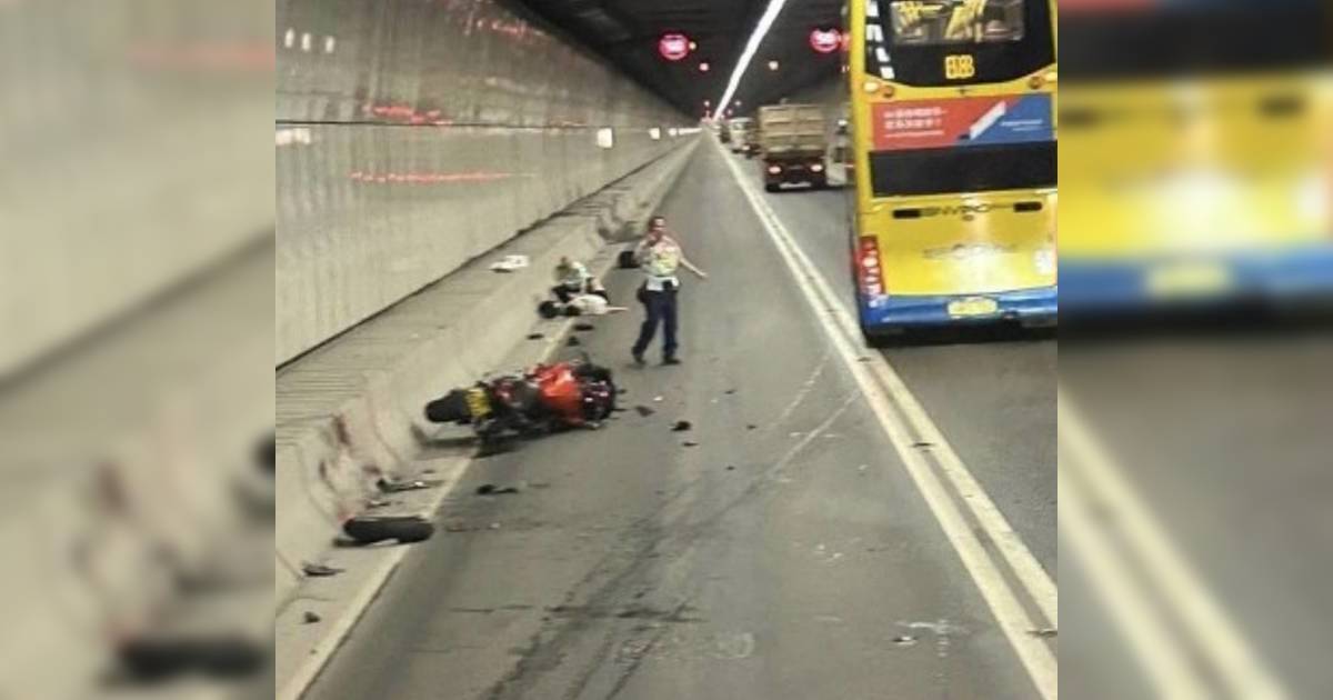 龍山隧道電單車疑失控連撞｜前輪飛脫碎片散一地鐵騎士倒地