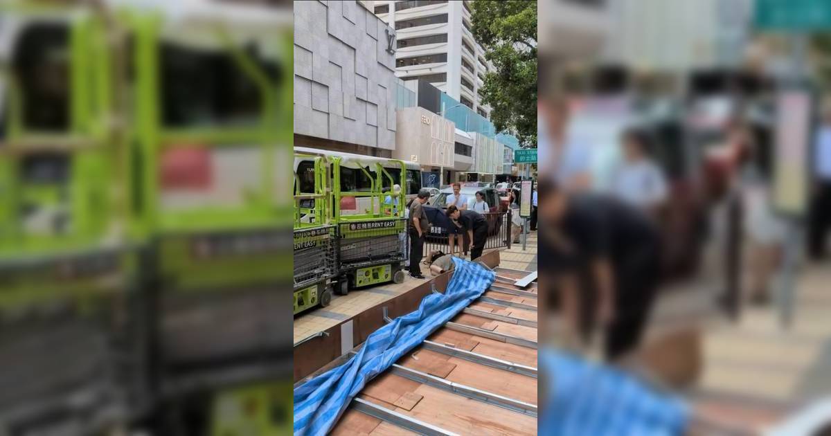 尖沙咀巨型圍板突然倒塌 父女飛來橫禍 慘被擊中畫面曝光